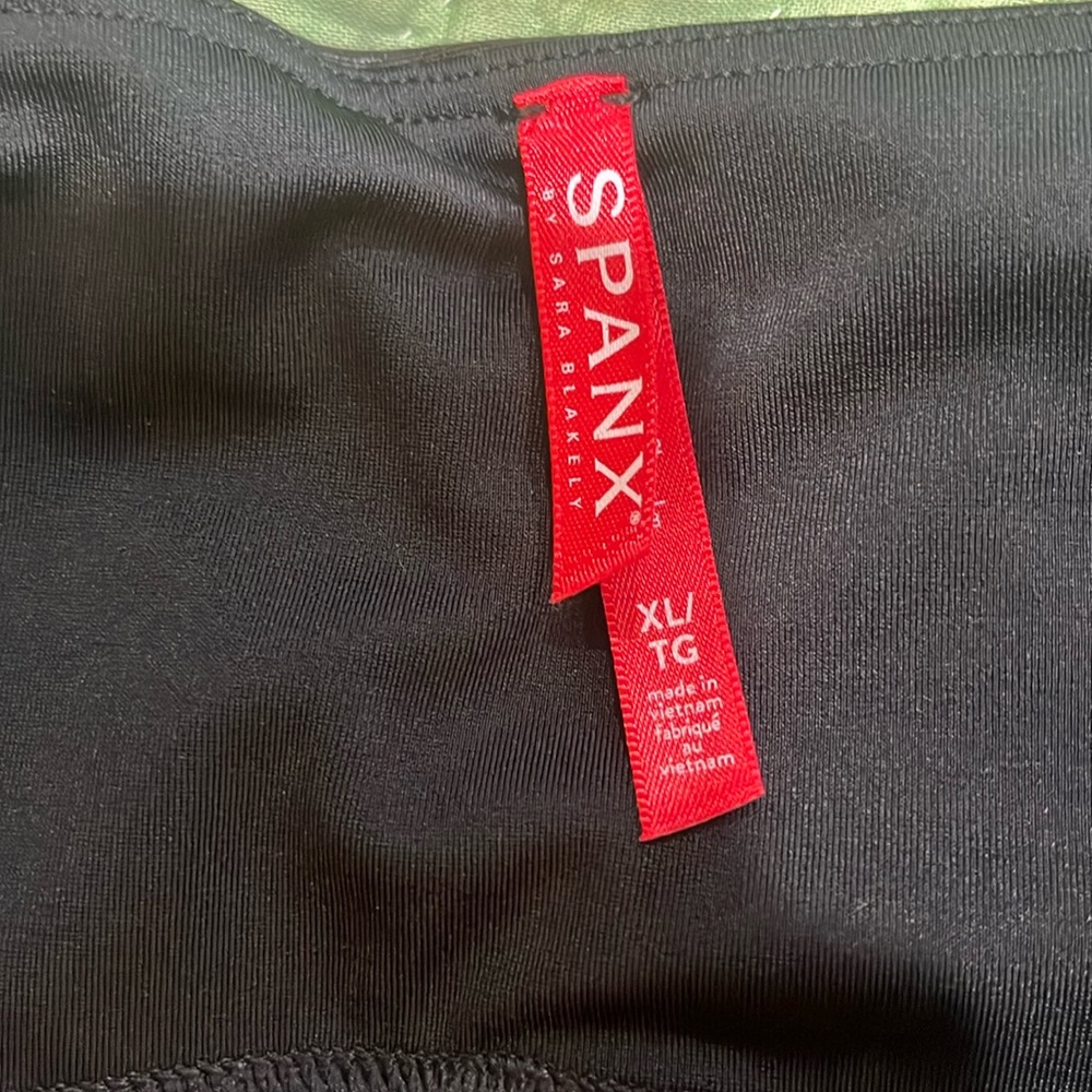 Spanx black leather look tights, size extra, large, new without tags. Never worn